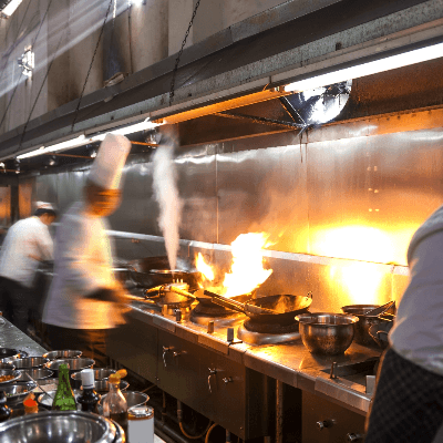 Commercial Kitchen With Cooks